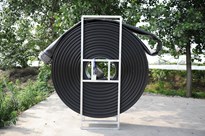 Ống cao su / PU dẹp cuộn tròn trong tay quay ; LAYFLAT hose lay on roller